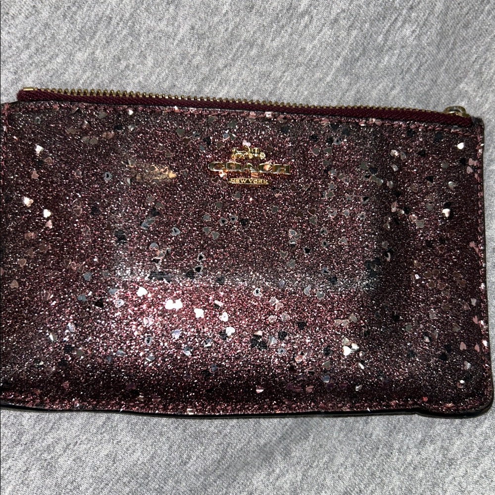 COACH Heart Glitter Small Wristlet in Raspberry Sparkling.
